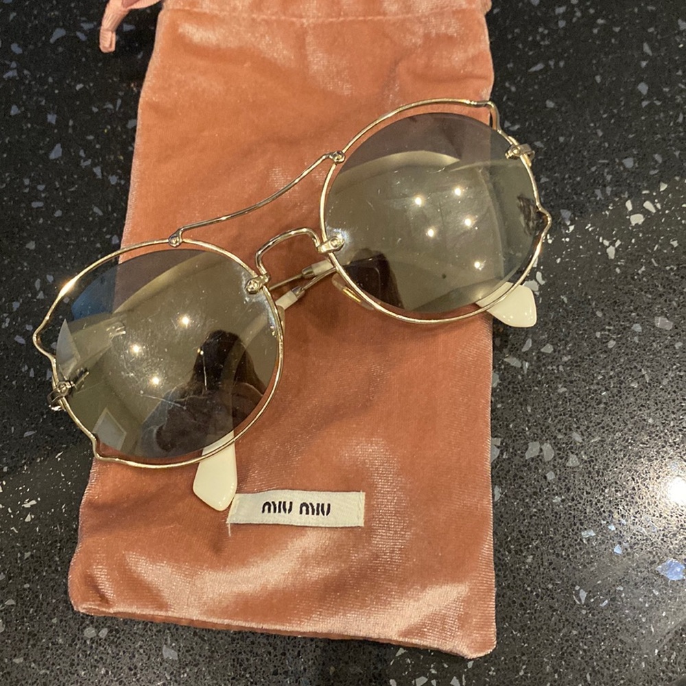 Slightly worn sunglasses